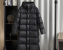 Phoebe™ Lange Daunenjacke – Ihr modischer Begleiter für Herbst und Winter
