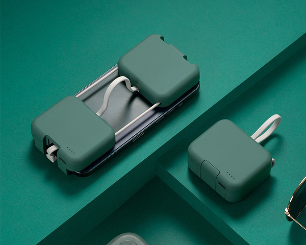 PocketCharge™ - Kompakte Mini-Powerbank mit Telefonhalterung